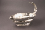 A shaped oval silver sauceboat