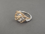 A pink and white gold ring