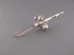 A silver rattle