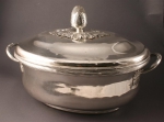 An oval silver-plated tureen